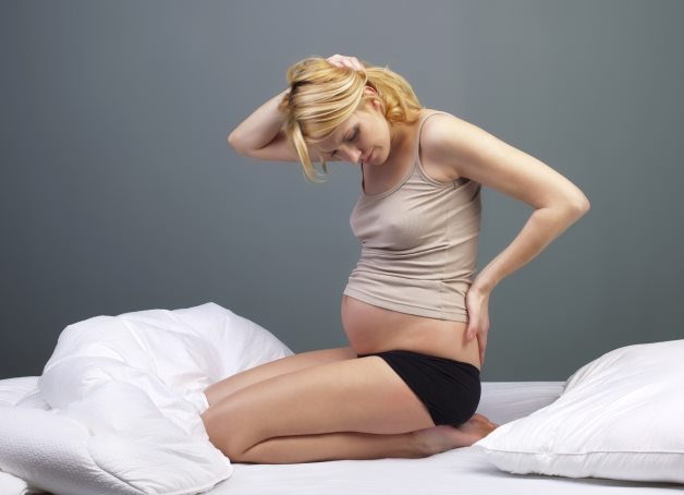 после родов болит спина в области поясницы что делать и как лечить